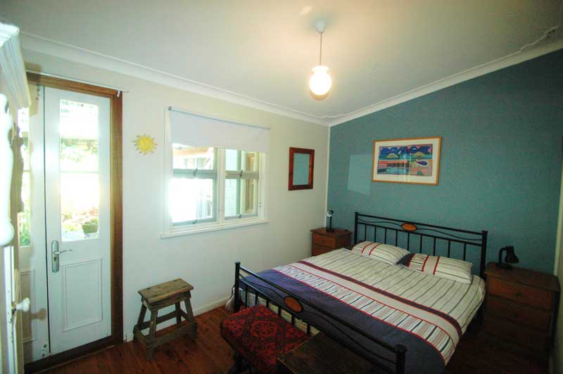 Bedroom at Copa Shells Beach House - A pet friendly holiday accommodation beach house with dog friendly beaches at Copacabana Beach on the Central Coast NSW