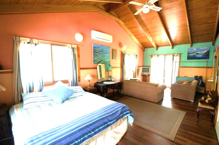 Main bedroom at Sanctuary Bush to Beach House. A pet friendly accommodation beach house with dog friendly beaches for your holiday at Nambucca Heads near Valla Beach, Mid North Coast NSW 